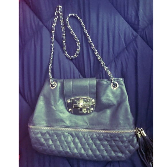 Gray shoulder bag. Gold exterior features. - Picture 1 of 2